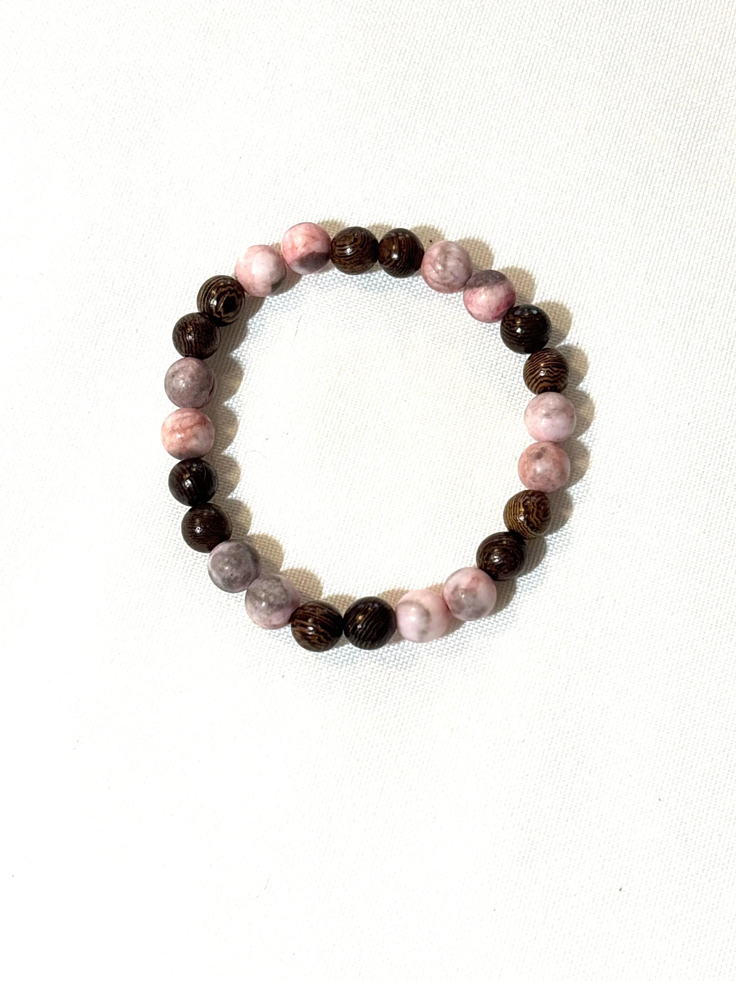 Dark wood and matte pink stone bracelet