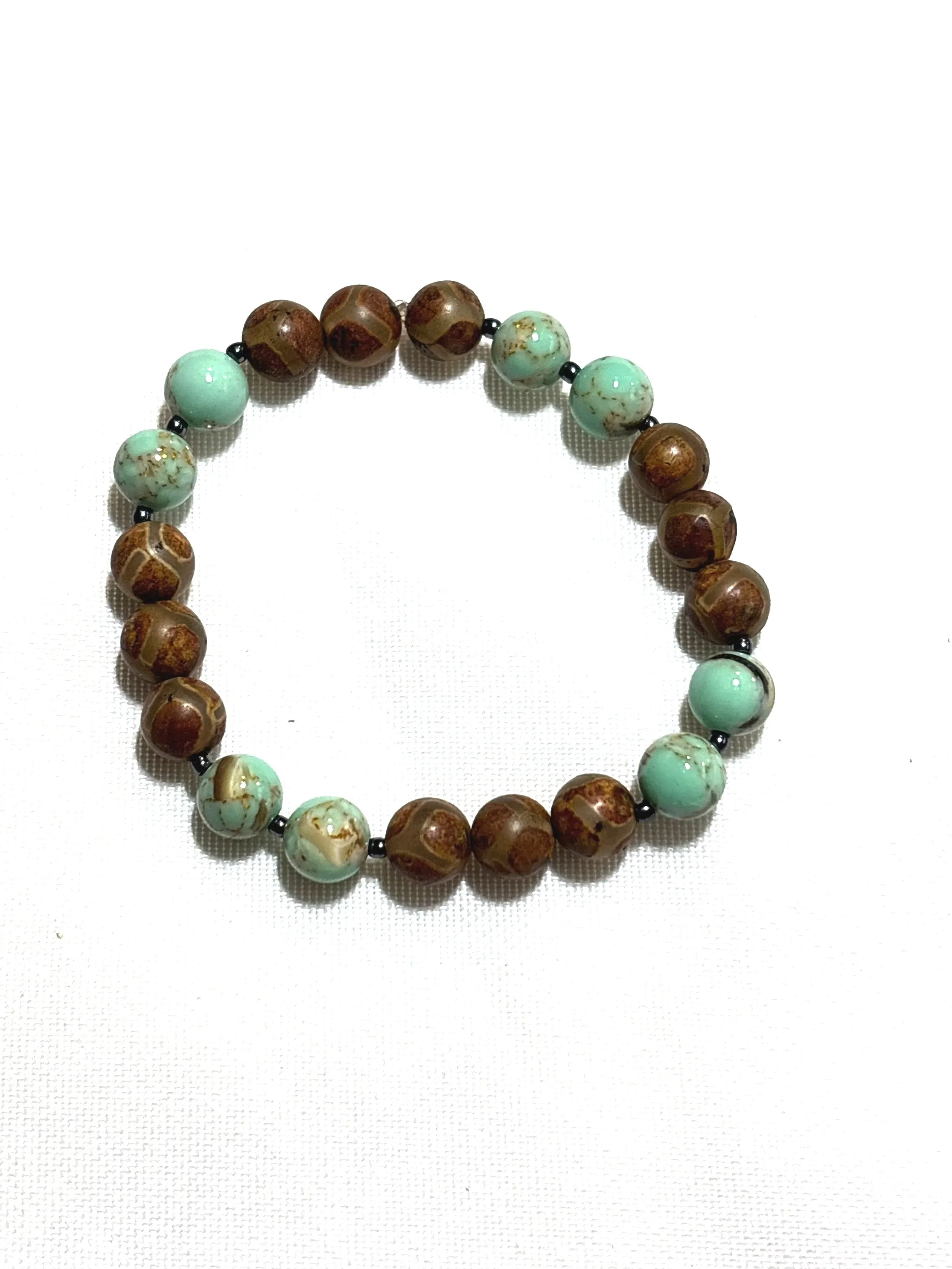 Brown stone with gold turquoise