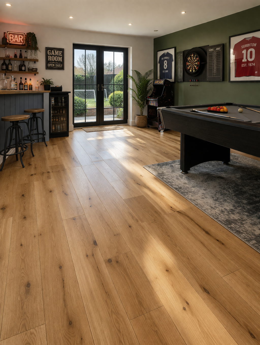 Engineered oak wood flooring fitted in a modern games room with pool table and bar area in Surbiton and Southwest London
