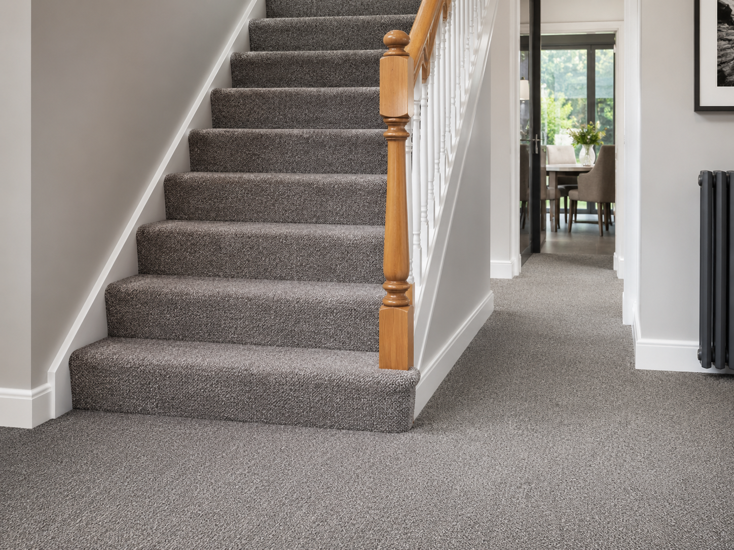 Grey fitted stair carpet in a modern home