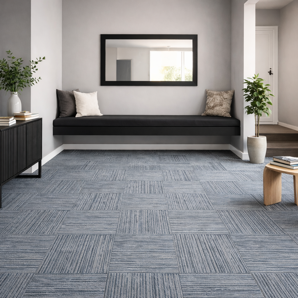 Modern office interior featuring grey patterned 600mm carpet tiles installed in a contemporary commercial workspace