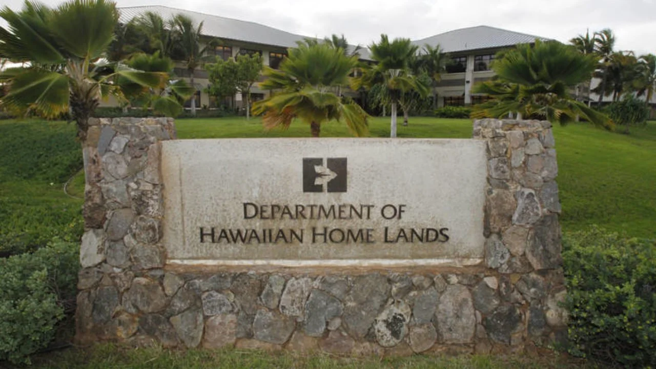 the main entrance sign and headquarters building for the Department of Hawaiian Home Lands (DHHL) in Kapolei, on the island of O'ahu.