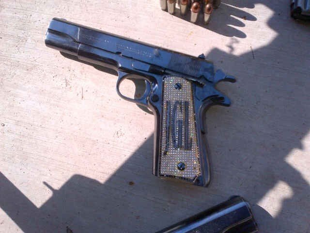 El Chapo’s personal pistol, marked with his initials “JGL”, a symbol of the violence behind the network’s leadership. Photo courtesy of J. H.
