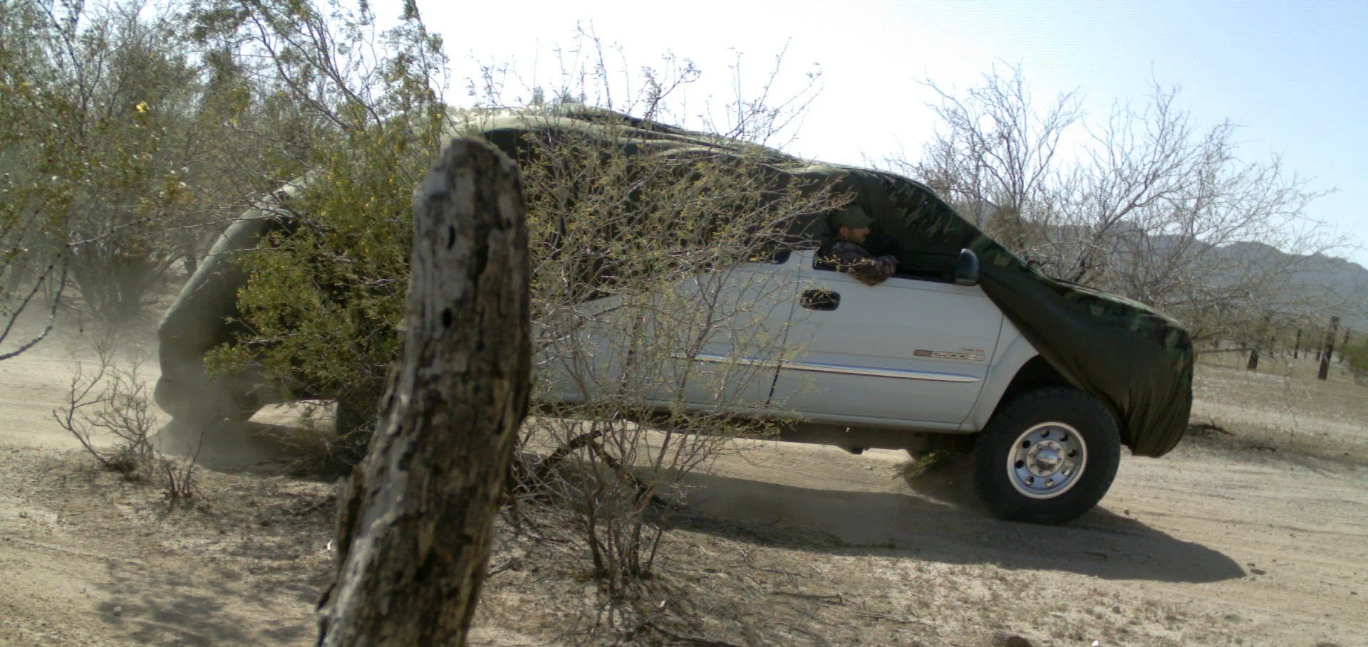 Memo’s crew drove heavily loaded vehicles along major smuggling routes in broad daylight. The camouflage cover allowed them to quickly hide the SUV in dense brush if law enforcement aircraft approached. Every movement was coordinated, with contingenc
