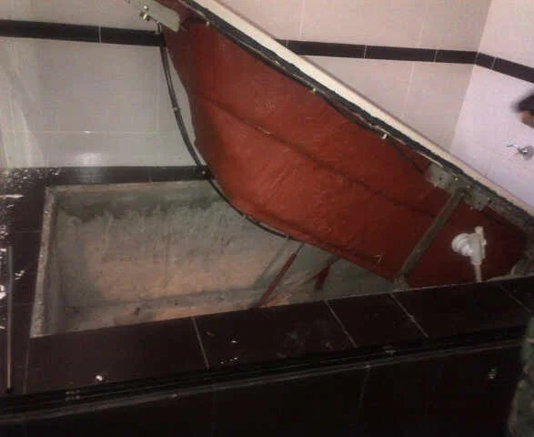A bathtub concealing a tunnel entrance inside one of Joaquín "El Chapo" Guzmán’s safe houses in Culiacán. Identical setups were used across multiple locations. Standardized for rapid escape. Photo courtesy of J.H.