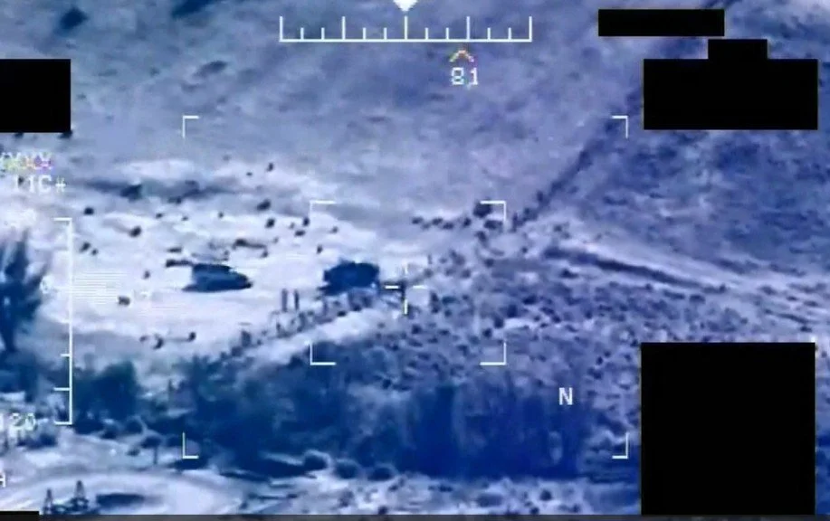 A four-image sequence showing a drug-laden SUV crossing into the US on a makeshift ramp thrown over the border fence near Nogales, AZ. The entire crossing took less than three minutes. The vehicle and the drugs were in Phoenix before most people fini