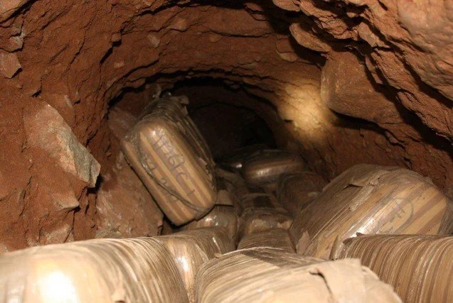 Smugglers abandoned this drug cargo mid-tunnel rather than risk capture. The load was disrupted. The organization was not. Within days, another load was moving through the same corridor.