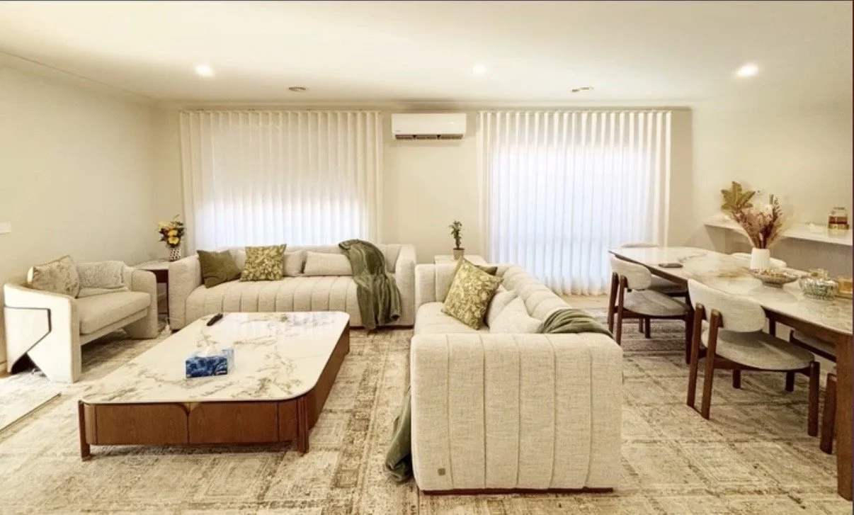 S Fold sheer curtains allow the perfect blend of light and privacy in a modern open plan lounge room