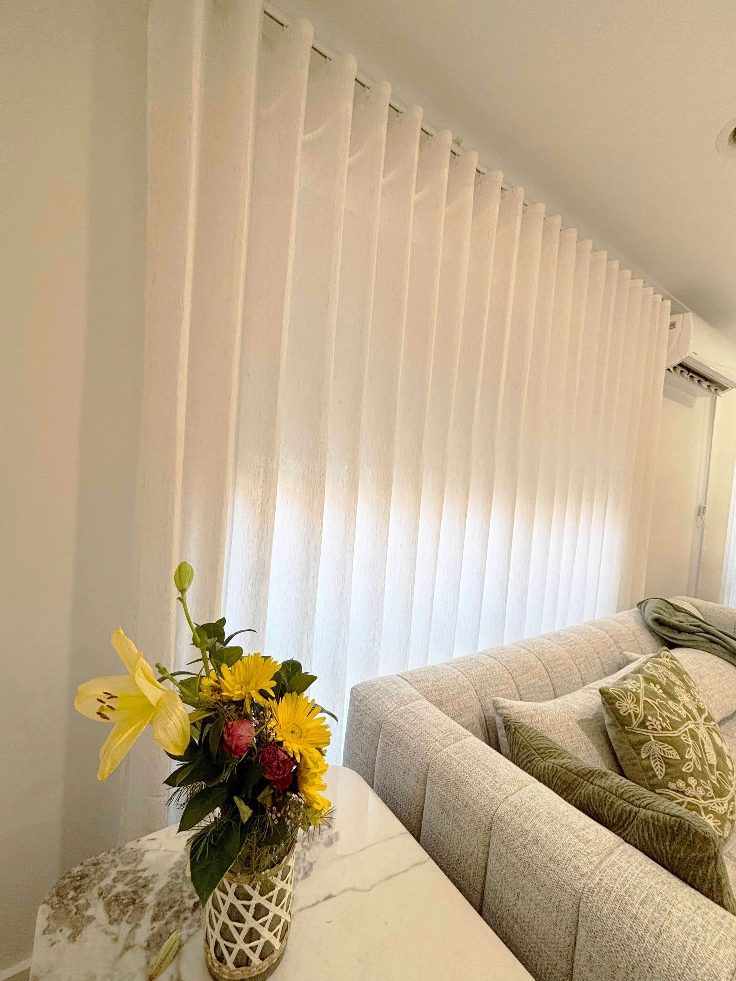 Beige S Fold or S Wave curtains compliment a Melbourne living room