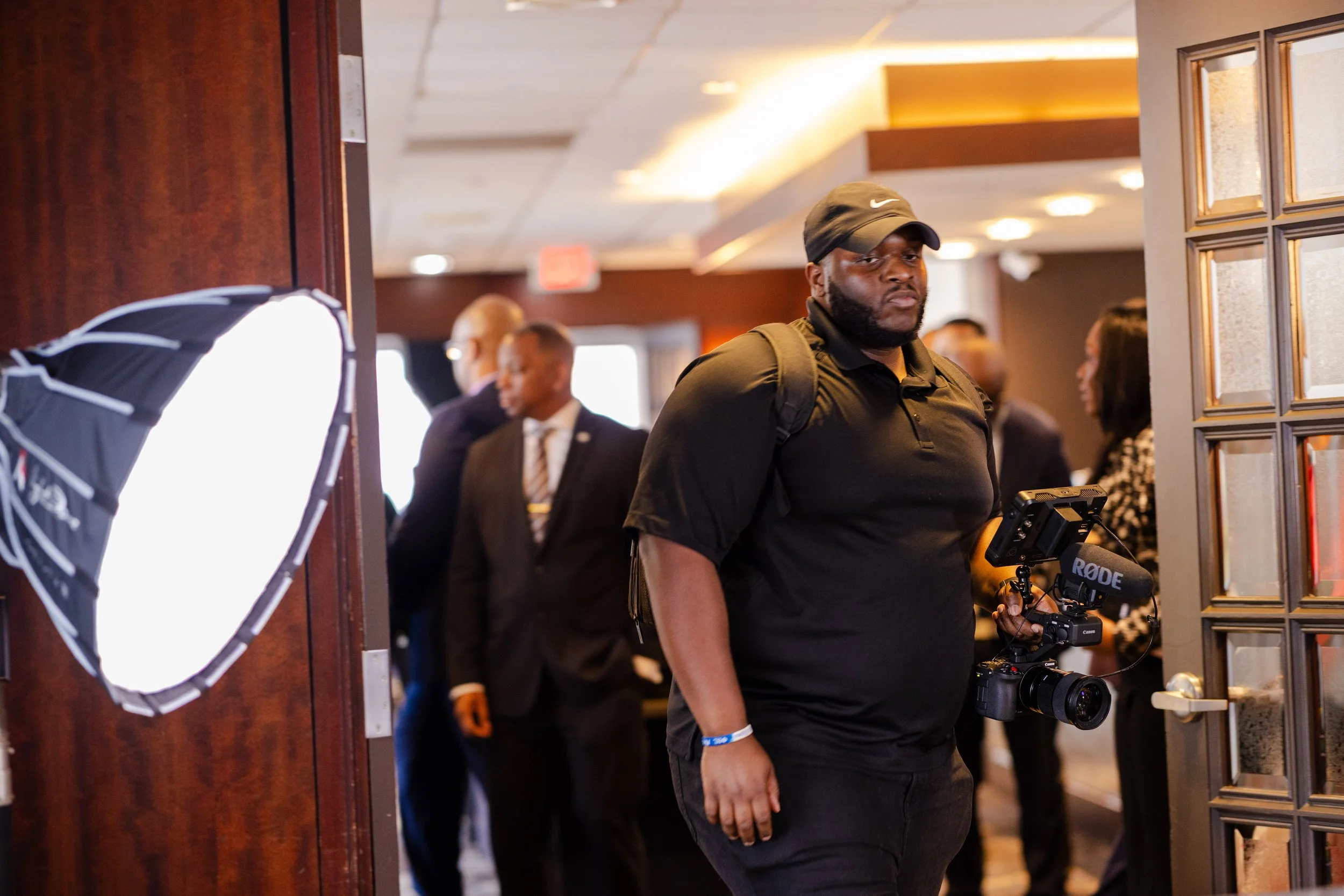 photographer holding a camera rig