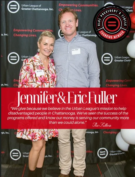 A man and woman standing together at an event for the Urban League of Greater Chattanooga. They are smiling and dressed in semi-formal attire. Behind them is a backdrop with the league's logo and slogan, and a large red banner with white text that introduces Jennifer and Eric Fuller and features a quote about their support for the Urban League's mission.