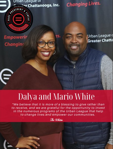 Daly and Mario White standing together at Urban League event, smiling, woman wearing glasses and maroon top, man in blue vest, background with Urban League logo and text, red banner with quote.