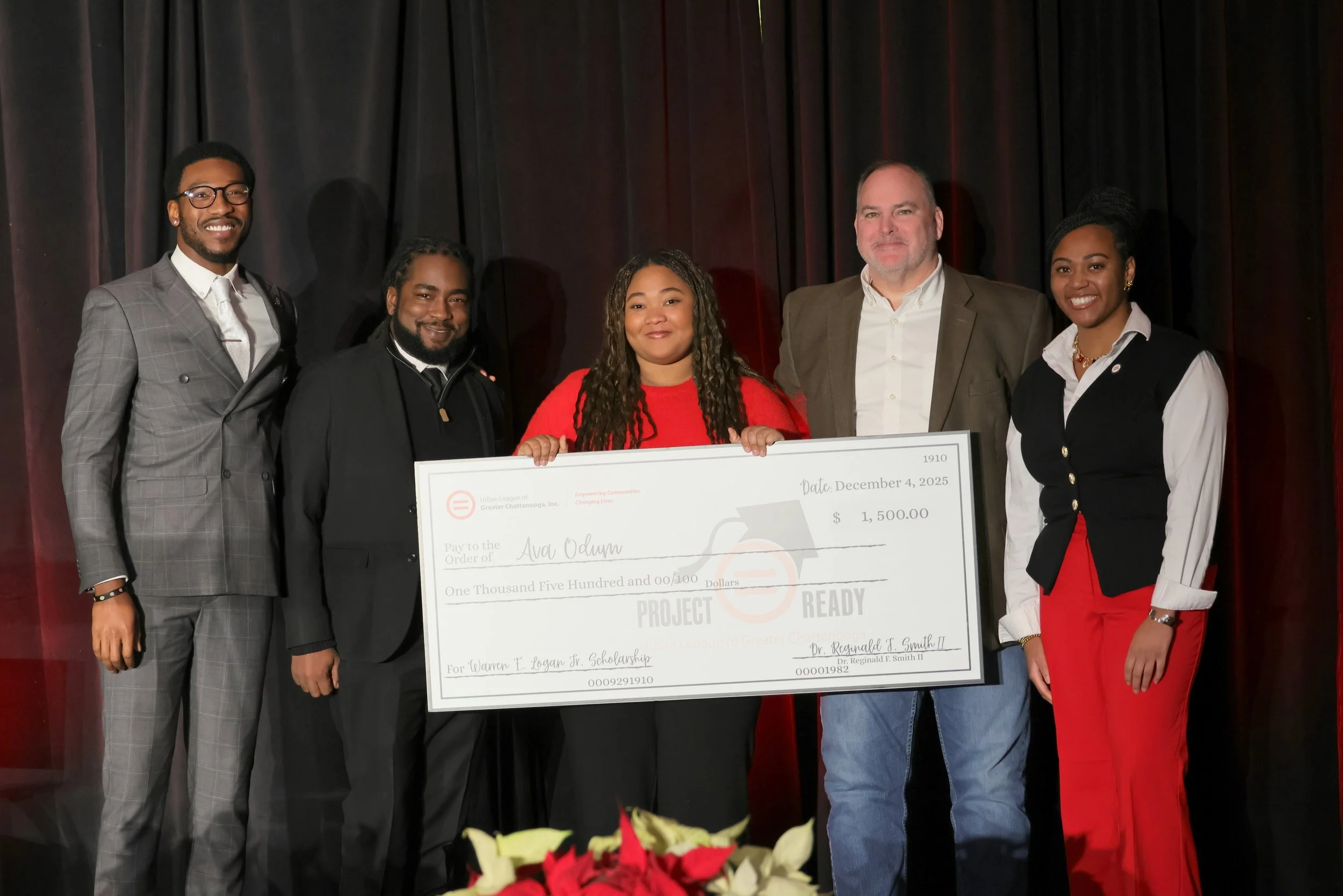 Ava Odum of East Hamilton pictured holding Warren E. Logan, Jr. NAS Scholarship check for $1500