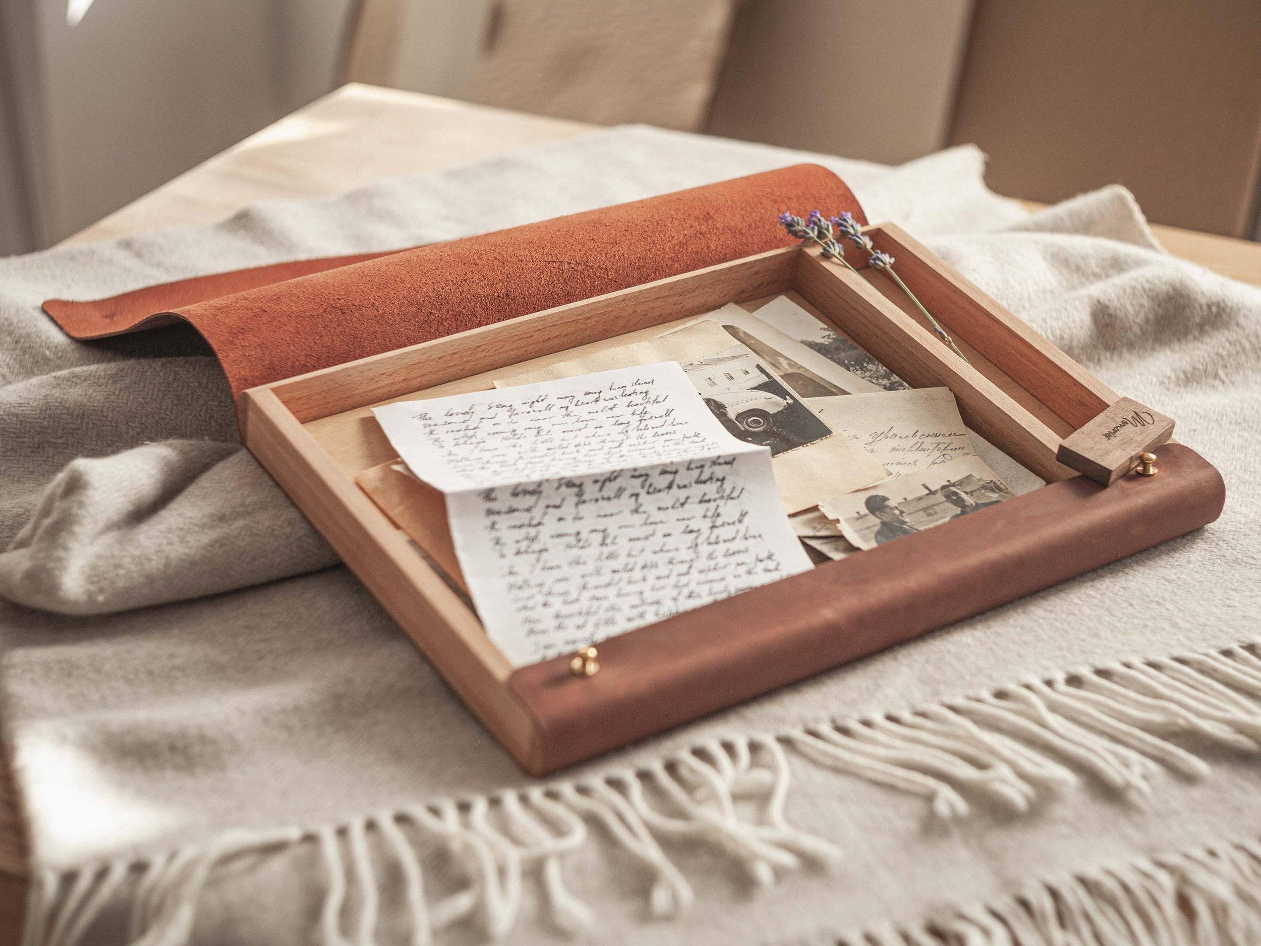 Photographs, handwritten letters and personal keepsakes gathered together