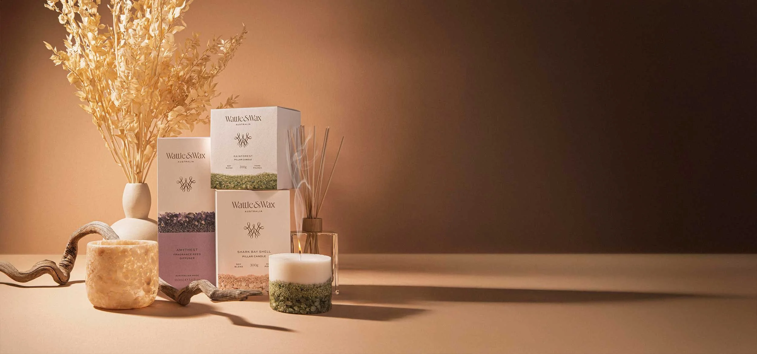 The Wattle & Wax range of candles and reed diffusers