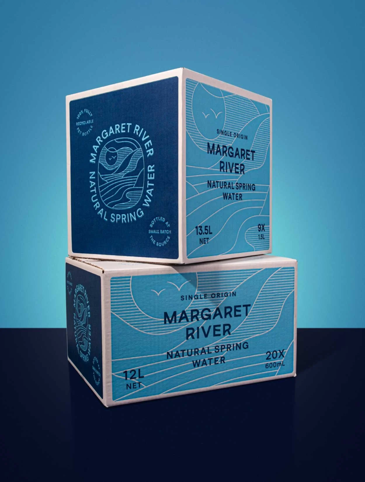 The outer packaging of the boxes for the 600ml and 1.5 litre Margaret River Natural Spring Water bottles designed by Perth graphic designers, Dessein