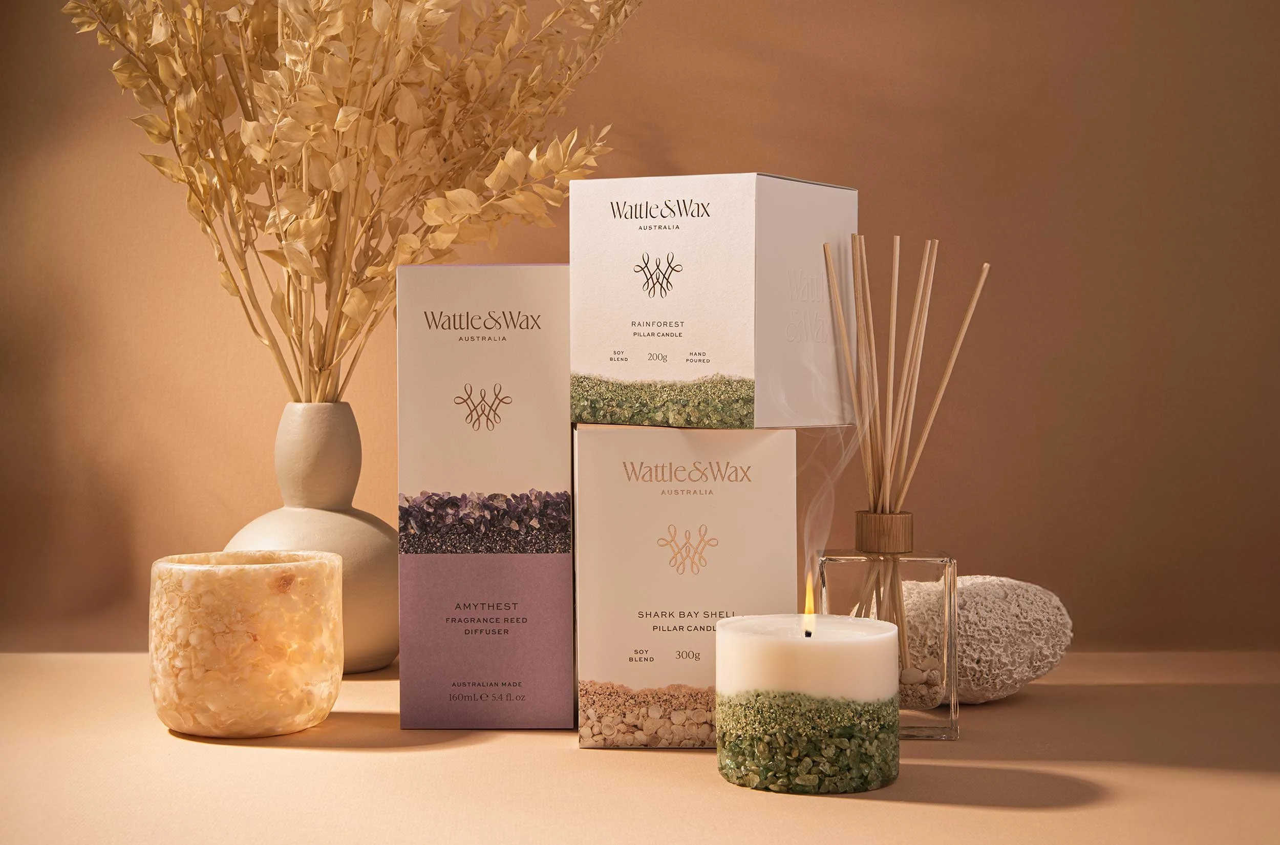 A stylised image showcasing Wattle and Wax's product range
