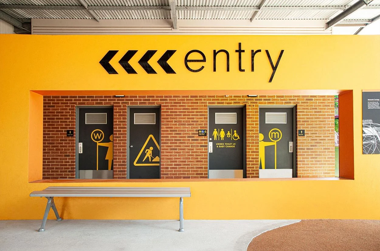 The entry to the Revolutions Transport Museum at Whiteman Park, featuring wayfinding signage designed by Dessein