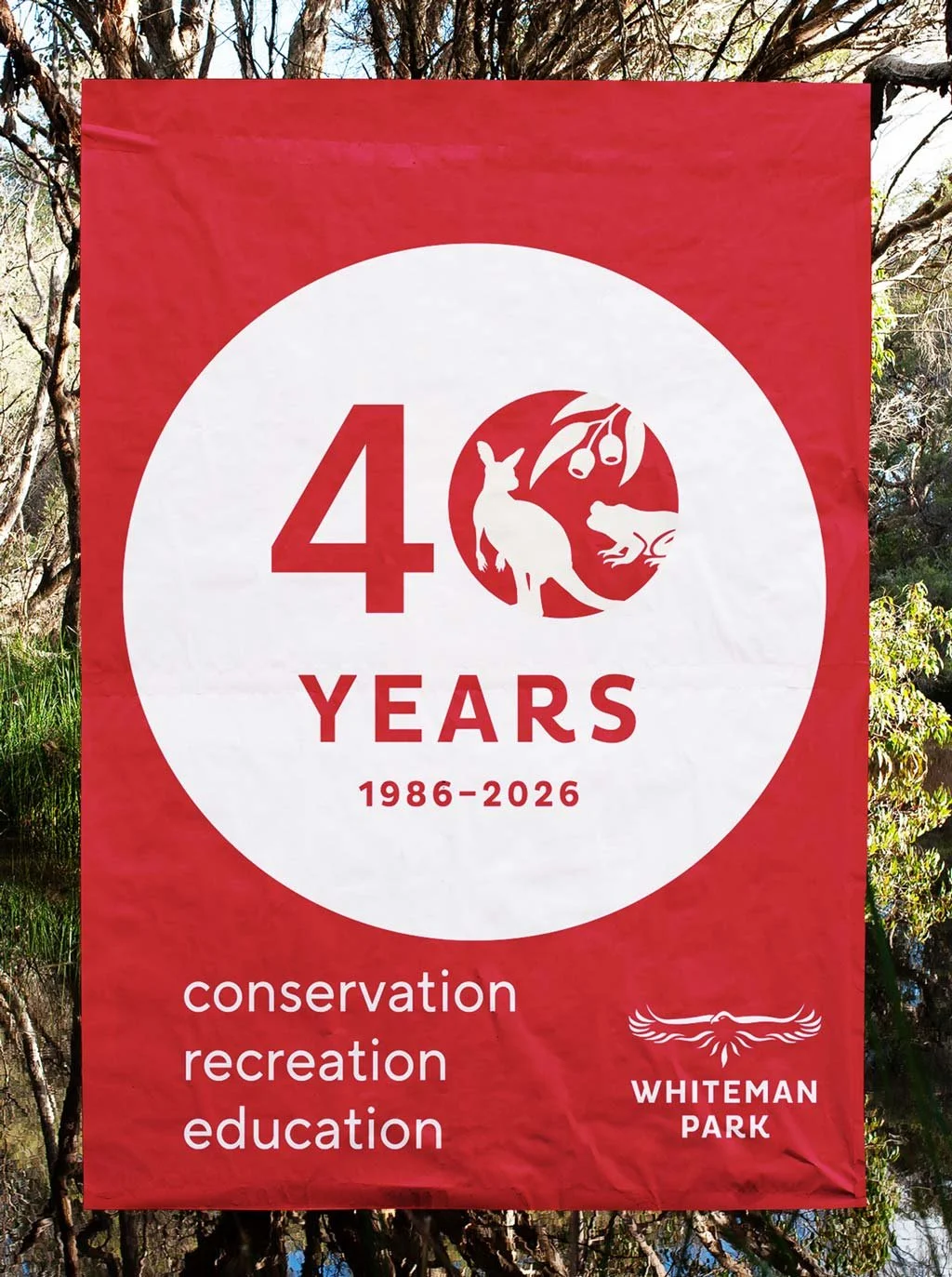 A outdoor banner celebrating Whiteman Park's 40 year anniversary
