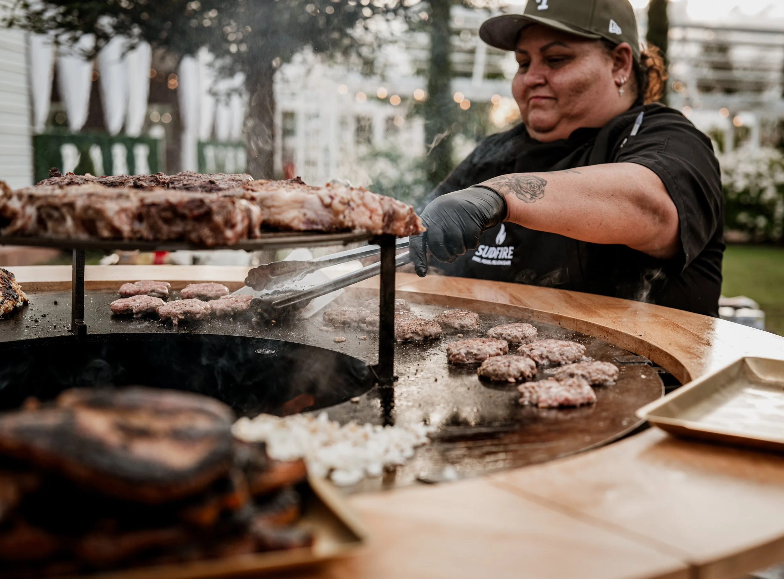 Live fire cooking on Sudfire Hearth carbon steel surface