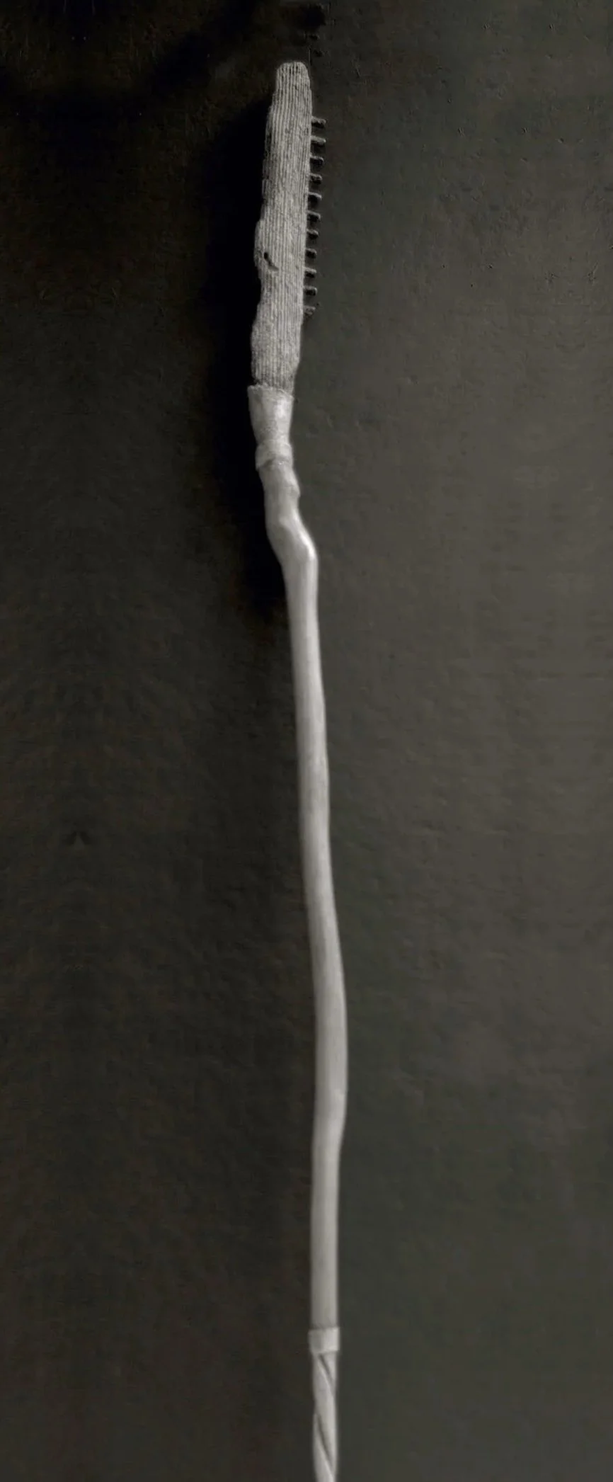 Pathing Stick #22, approximately 72",
mixed media on wood