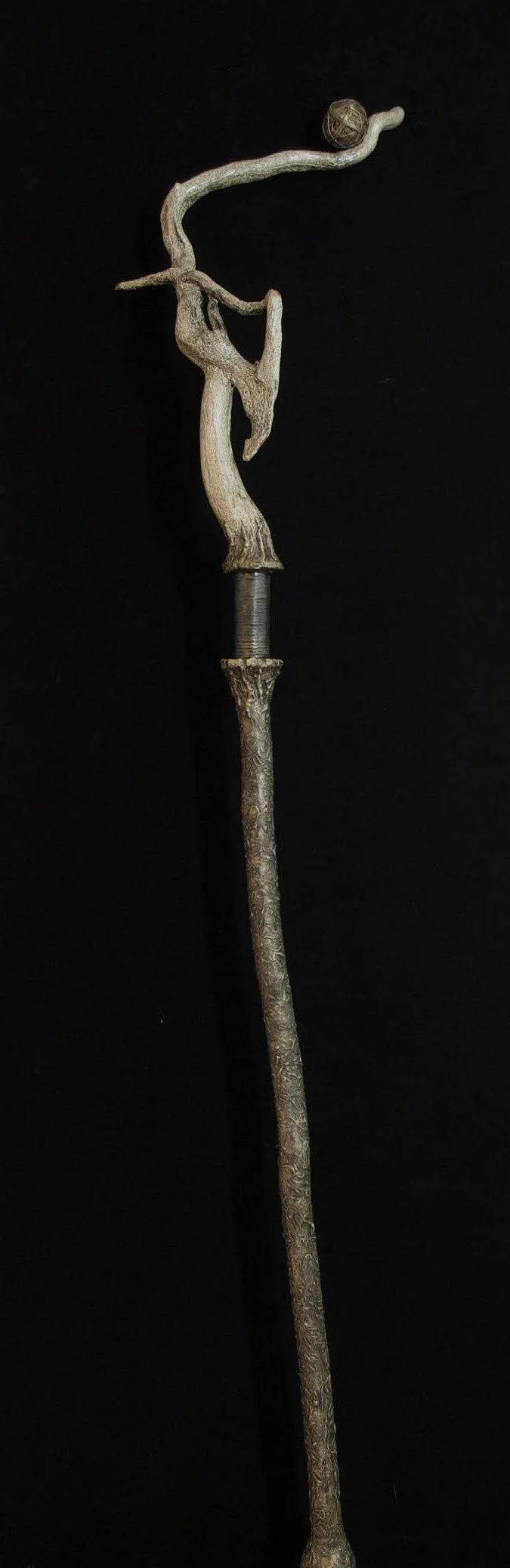 Pathing Stick #50, approximately. 72",
mixed media on wood