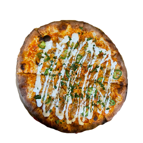 Pizza topped with green onions, a white sauce drizzle, and cheese.