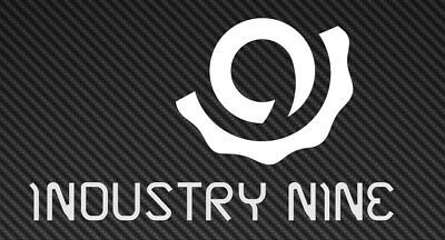 Industry Nine logo with a stylized swirl above the words 'Industry Nine' on a black textured background.
