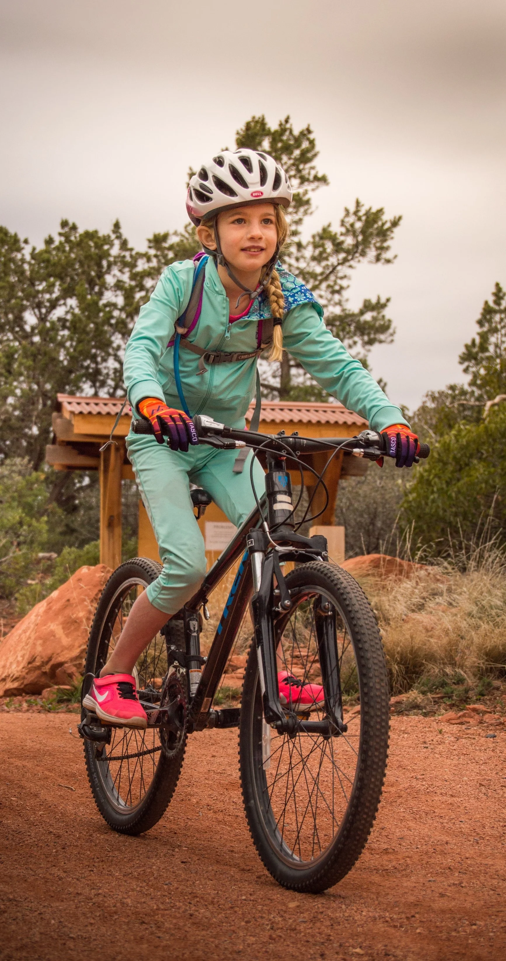 Female Mountain Biker, Young Girl Mountain Biker, Women's empowerment through bikes,