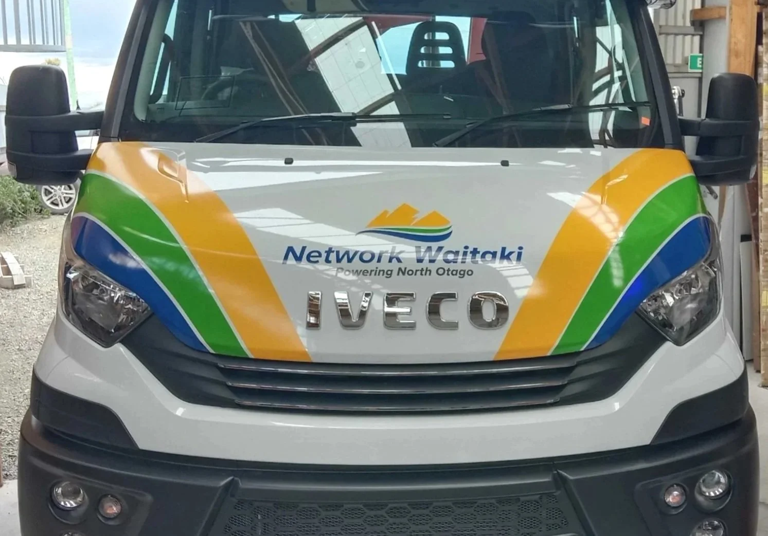 Vinyl graphic application to vehicle front