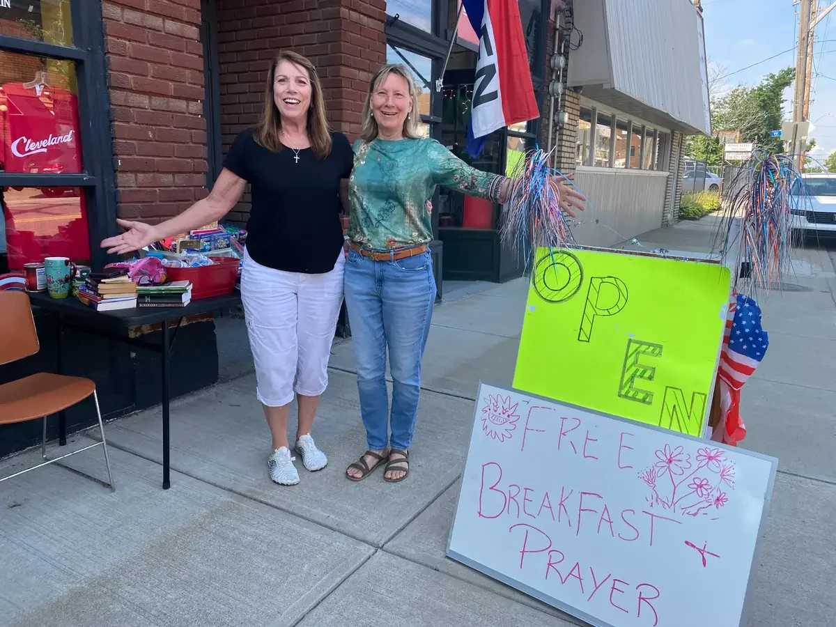 Welcoming the community for breakfast and prayer.
