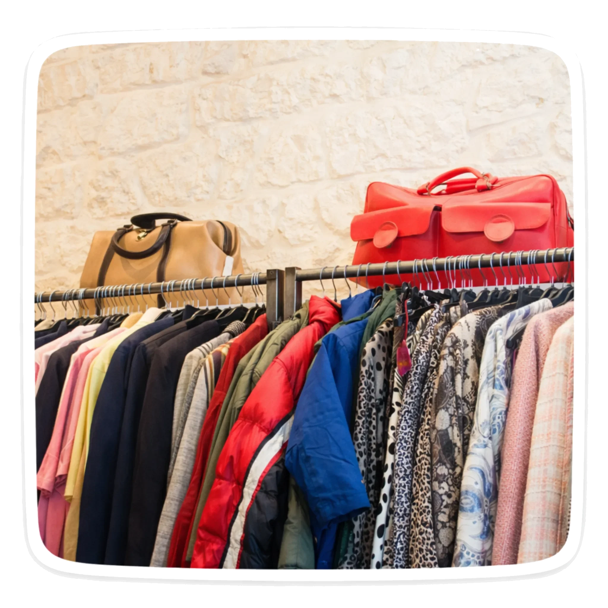 clothing, purse, and bag on rack