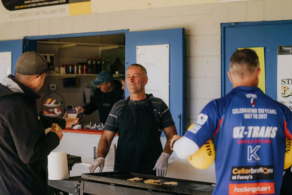 Hepburn Burra volunteers manning the BBQ on game day