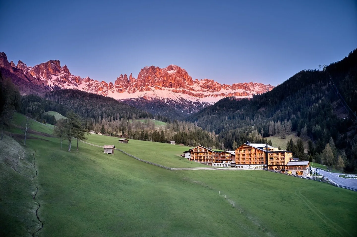 At dusk, the Dolomites glow pink. This isn&rsquo;t from the sky; it comes from the rock itself. 
What appears as stone is actually ancient coral, compressed into pale limestone over millions of years. 

During golden hour, this limestone captures the