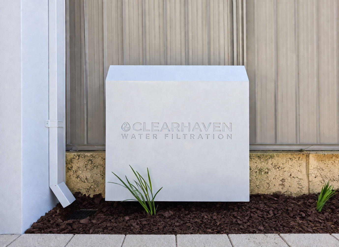 ClearHaven whole-home water filtration system with a custom Surfmist Colourbond cover seamlessly integrated into a Perth home.