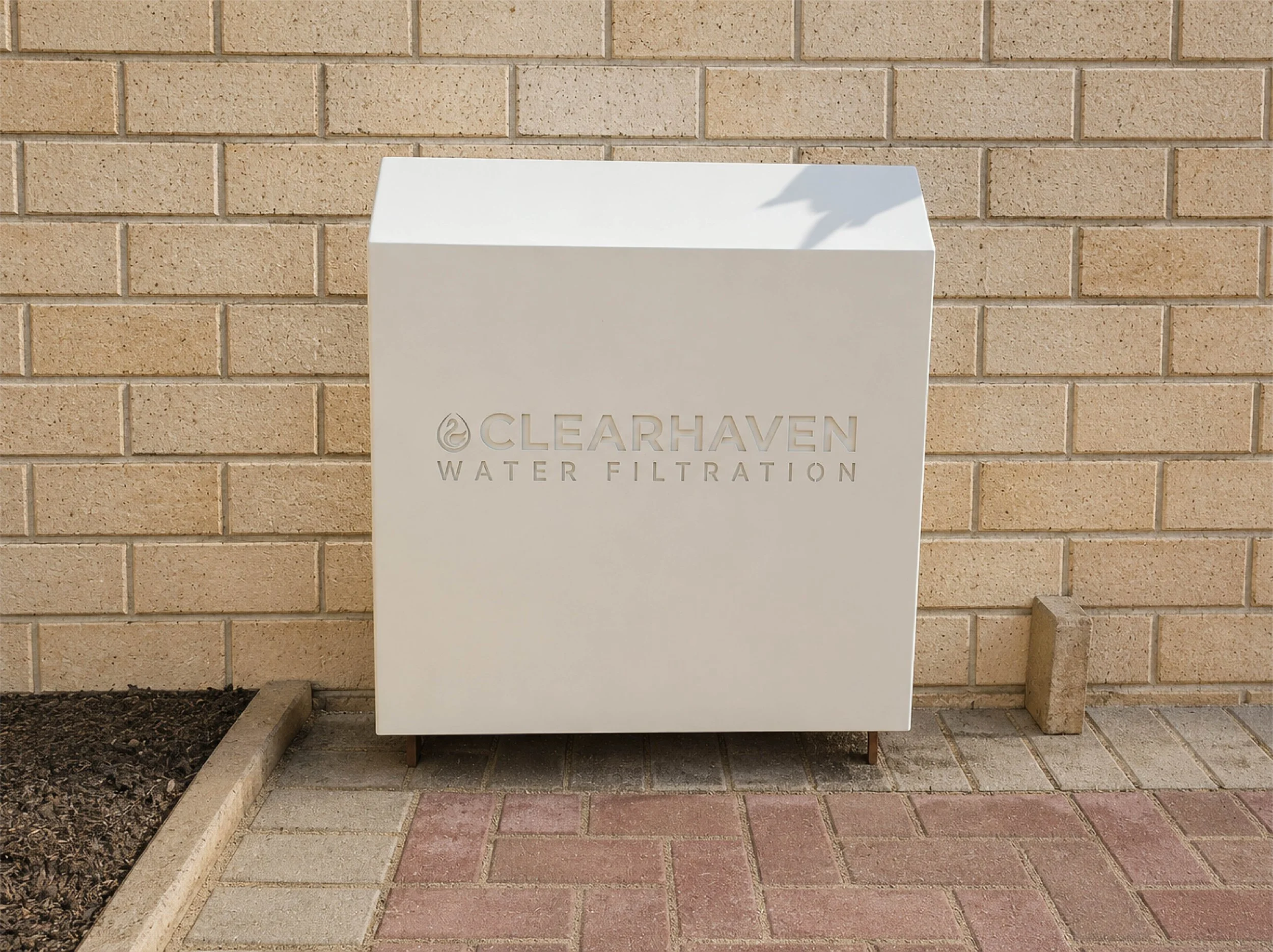 ClearHaven whole-home water filtration system with a custom Classic Cream Colourbond cover designed to complement a Perth home.