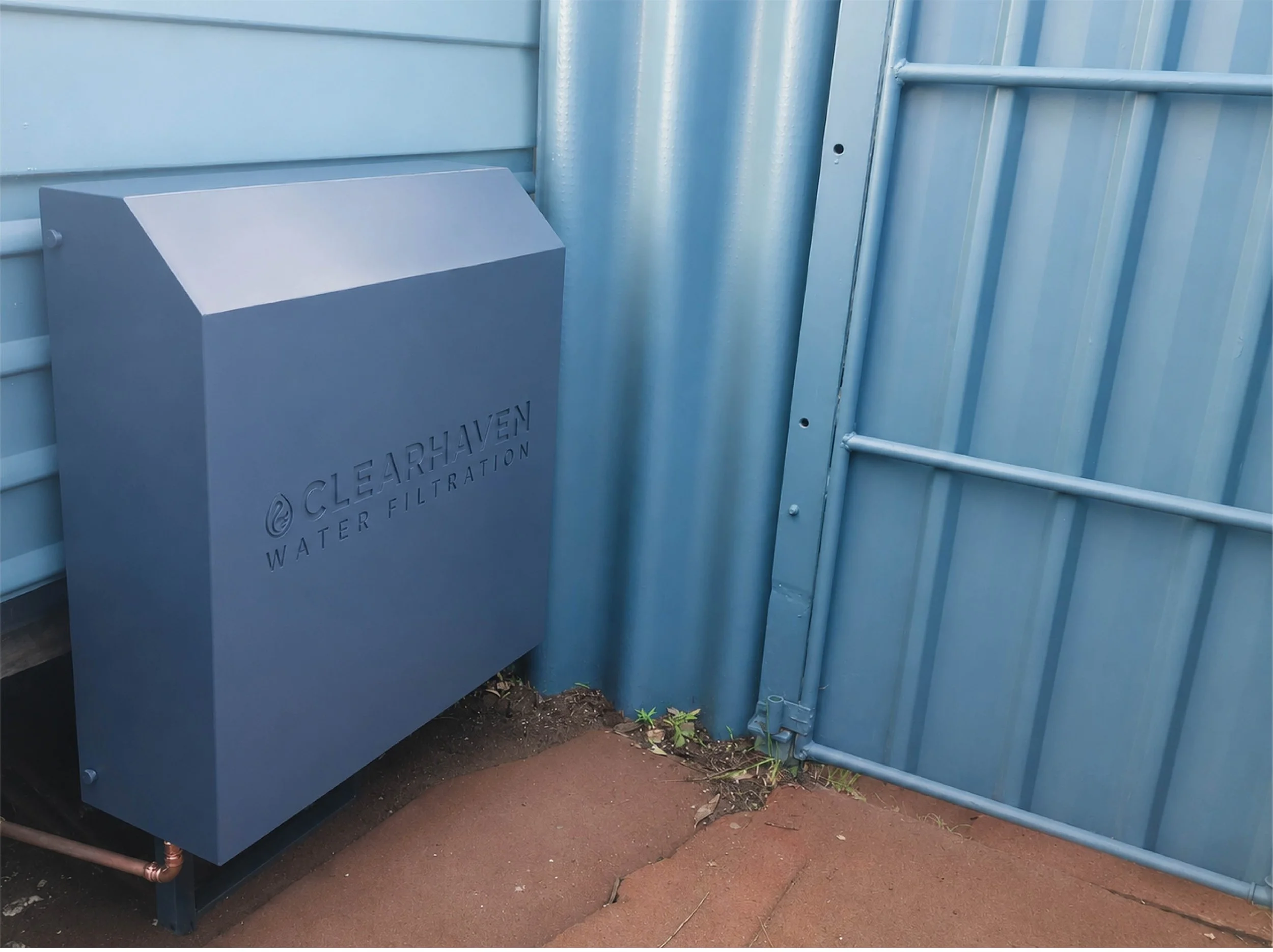 ClearHaven whole-home water filtration system with a custom Deep Ocean Colourbond cover installed at a Perth home.