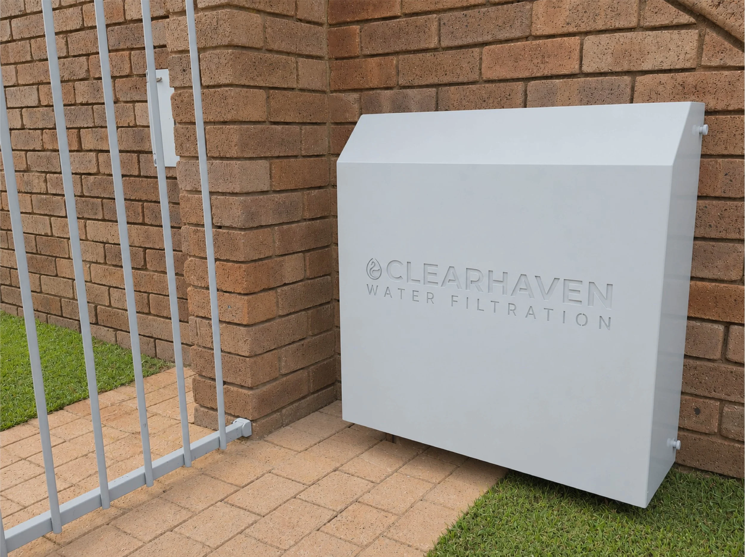 ClearHaven whole-home water filtration system with a custom Shale Grey Colourbond cover beautifully integrated into a modern Perth home.