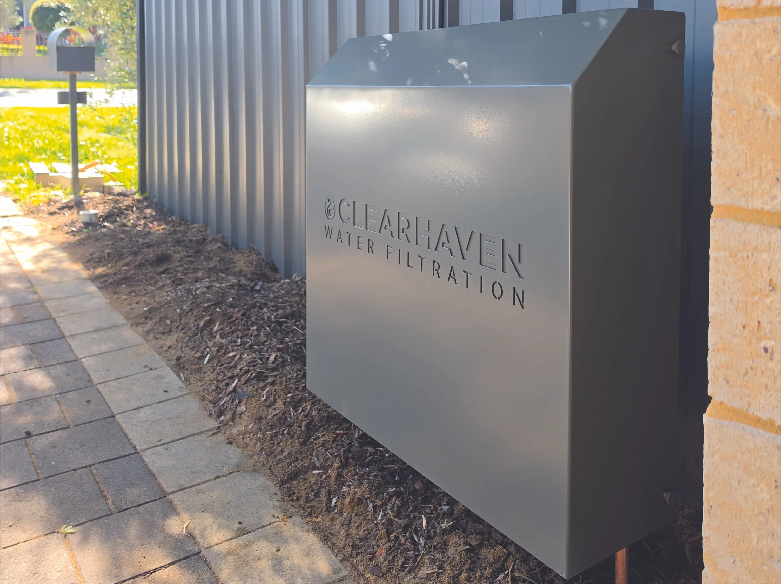 ClearHaven Water Filtration system with a custom Woodland Grey powder-coated enclosure installed at a home in Hamilton Hill, Perth.