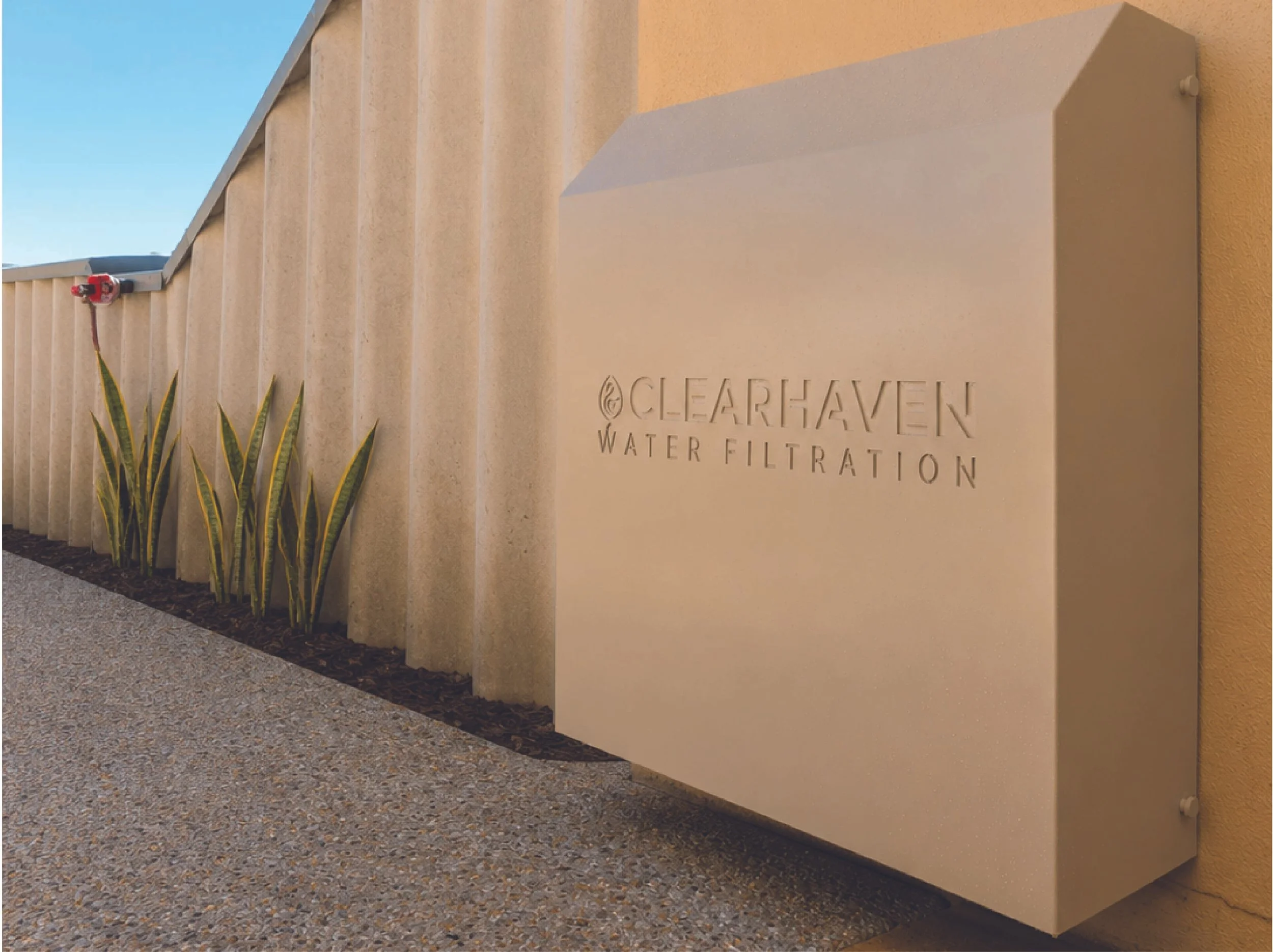 ClearHaven Paperbark water filtration unit installed against rendered wall in Port Kennedy