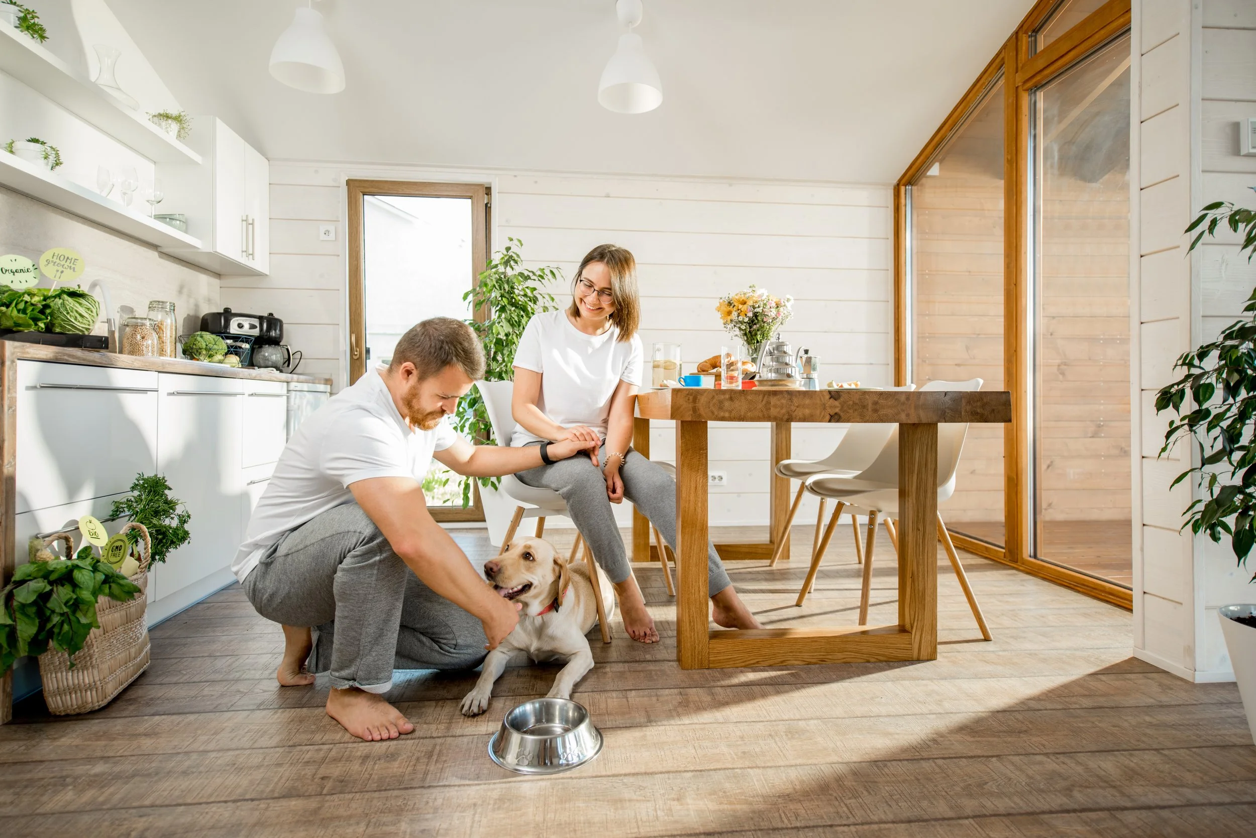 Family enjoying a bright, healthy home that reflects the benefits of whole-home water filtration and everyday wellness.
