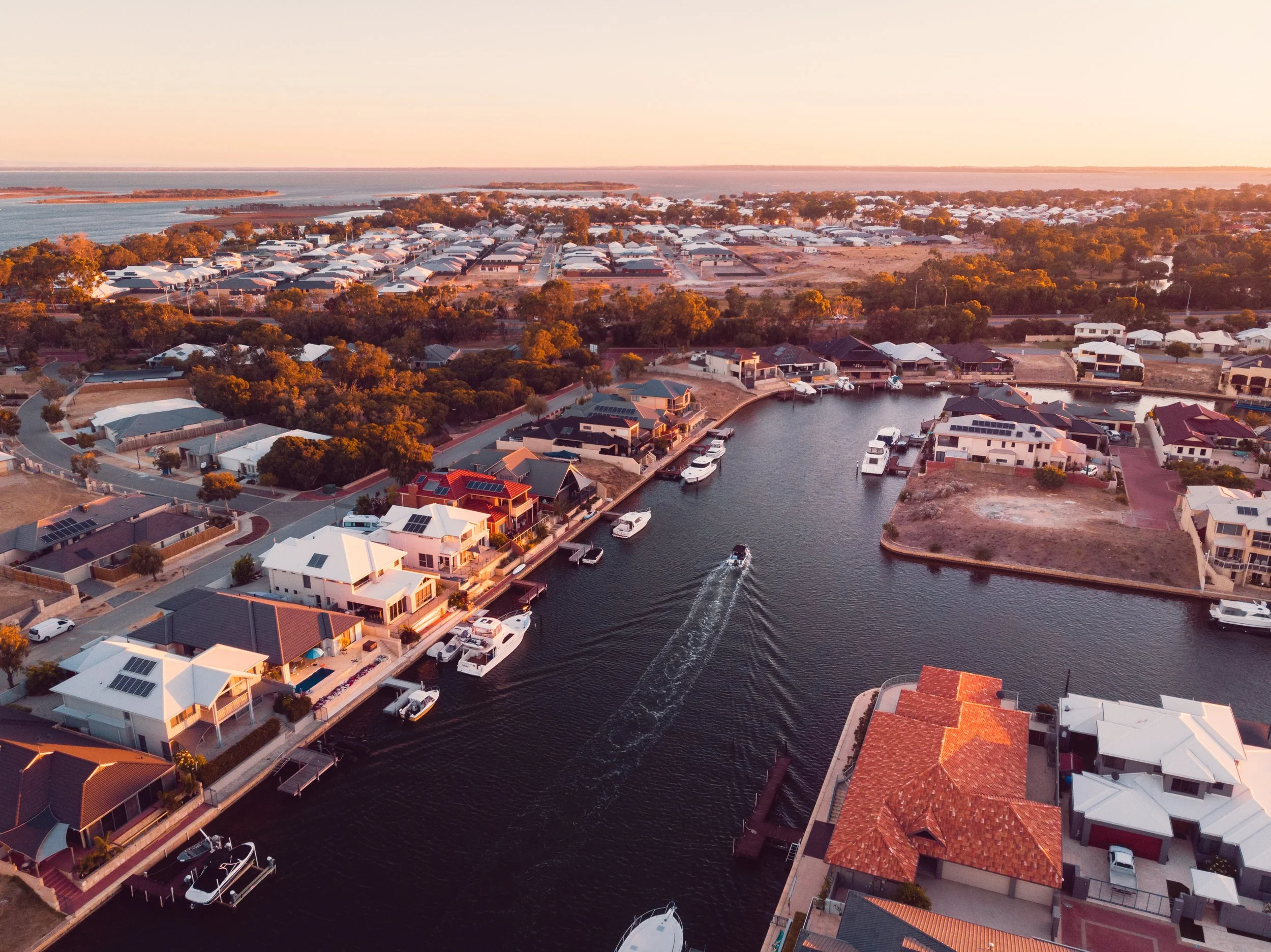 Aerial view of the canal waterfront in the City of Mandurah, Perth, showcasing the coastal community where ClearHaven provides premium whole-home water filtration systems professionally installed for homeowners throughout the City of Mandurah.