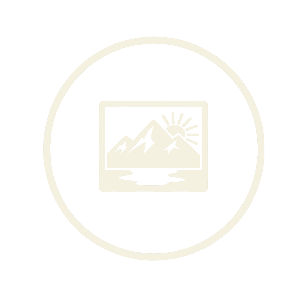 A black background with a white circular outline containing a mountain landscape with a sun and lake inside a framed picture.