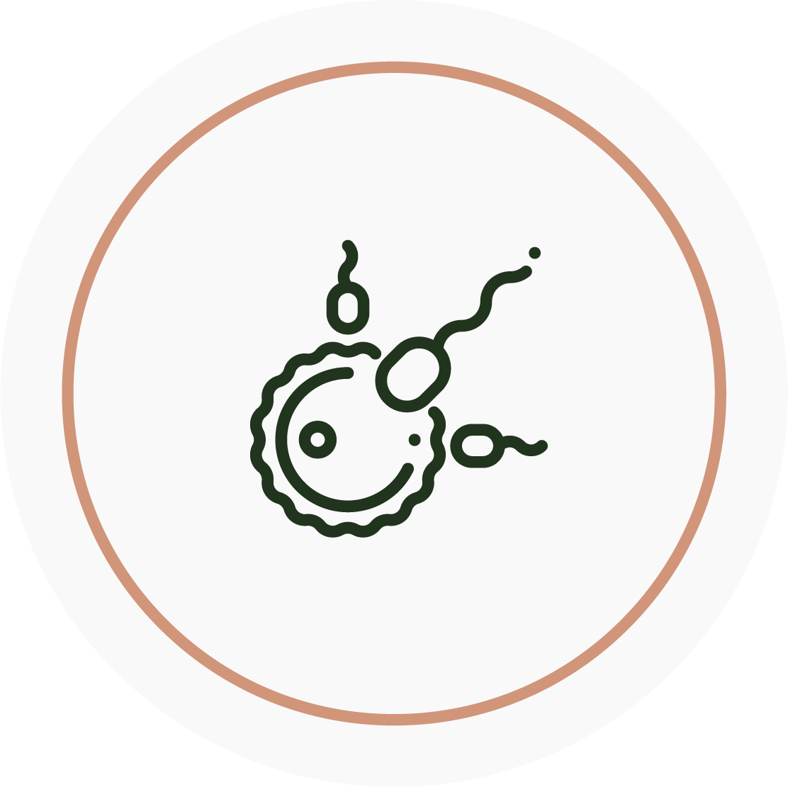 Line drawing of a sperm cell and an egg cell.