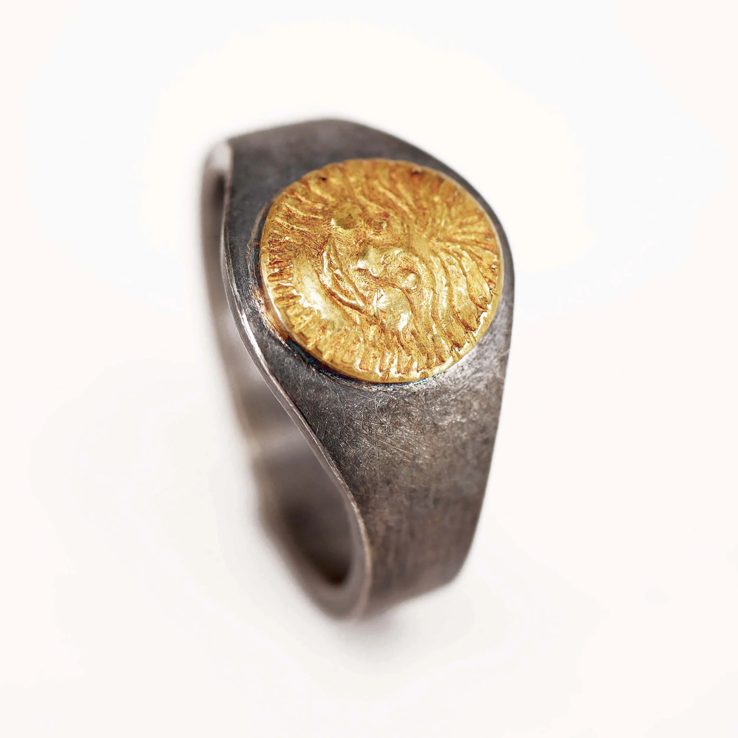 "Sonne" 900er Gelbgold, 925er Silber geschwärzt