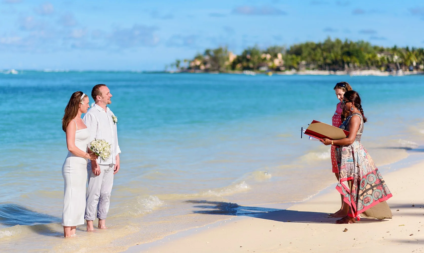 Bride &  Groom feet in the ocean at Palmar beach during civil ceremony