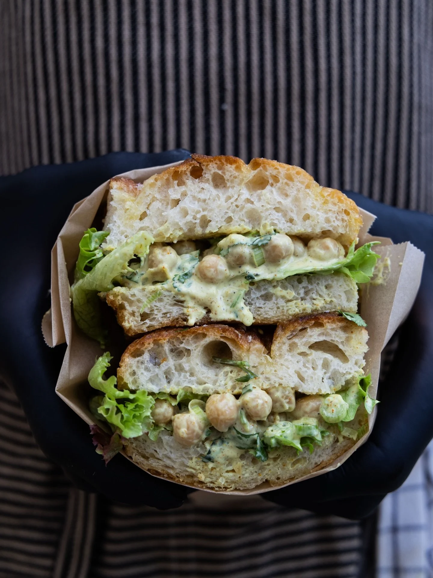 Introducing: The Golden Chickpea ☀️ 

Menu reveal #5: Classic Focaccia with Coronation Chickpea, Lollo Lettuce, Cucumber, Spring Onions &amp; Coriander.

Our homemade coronation sauce is honestly a game changer! 

#focacciasandwich #cirencestereats #