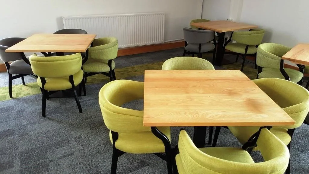 spike bar chairs recovered and painted.jpg