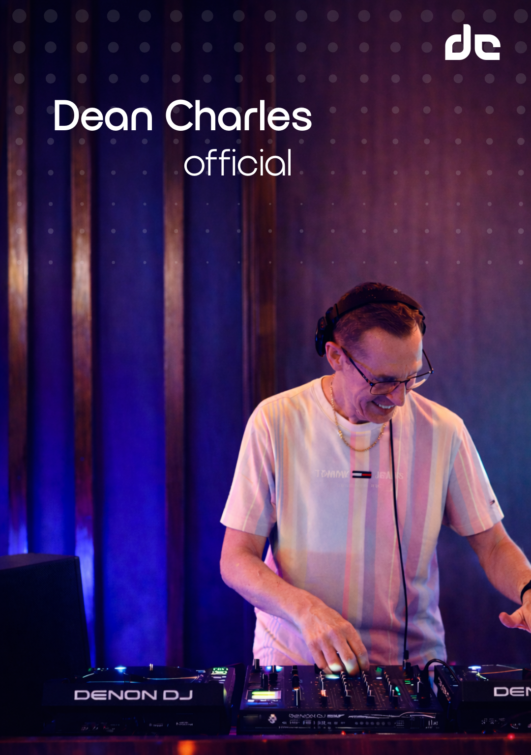 DJ Dean Charles with headphones DJing at De Arches Lounge with a dark background and purple lighting. The bar was located in Sentul, Indonesia.