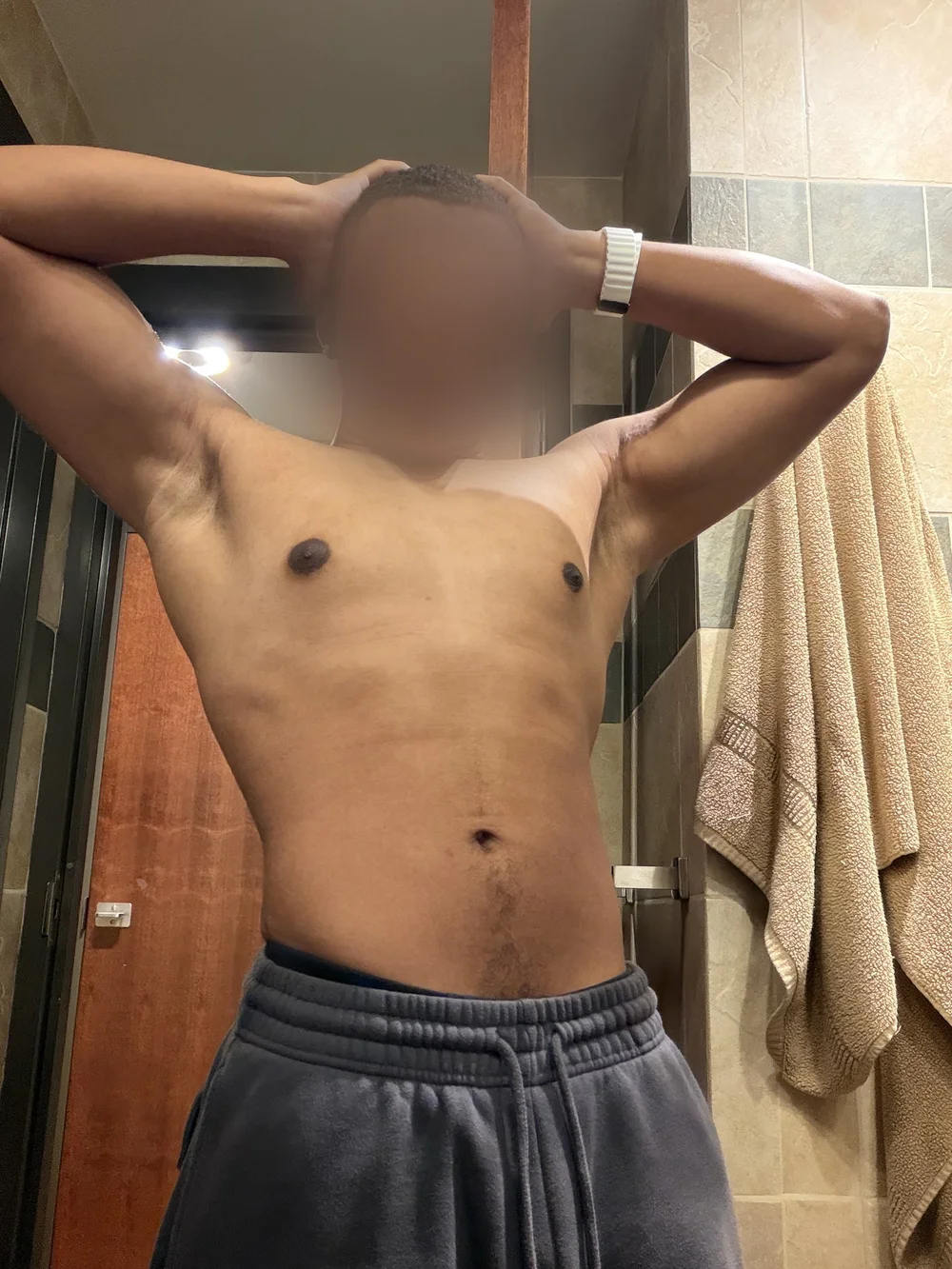 Malachi, flexing, after